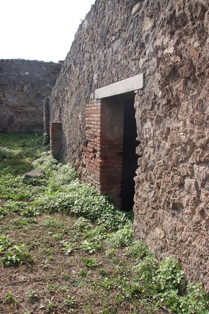 VIII.2.33 Pompeii October 2023. Doorway to room on west side. Photo courtesy of Klaus Heese.

