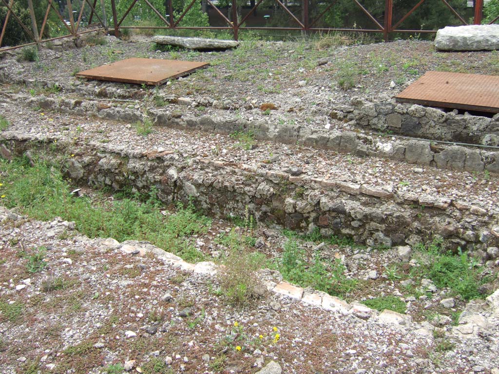 VIII.2.37 Pompeii. May 2006. Narrow masonry pool at the south end of the peristyle. Looking north-west.