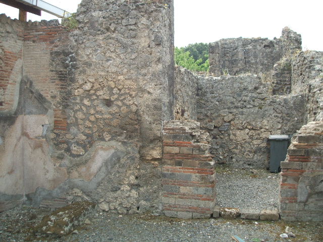 VIII.3.7 Pompeii.  Shop.  December 2007.  West wall.