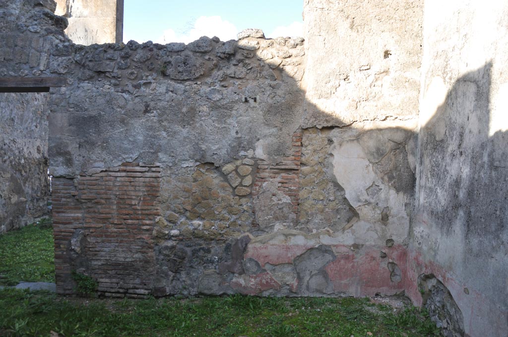 VIII.3.12 Pompeii. January 2024. 
North wall of triclinium, with doorway into VIII.3.11, on left, and north-east corner, on right. Photo courtesy of Domenico Esposito.
