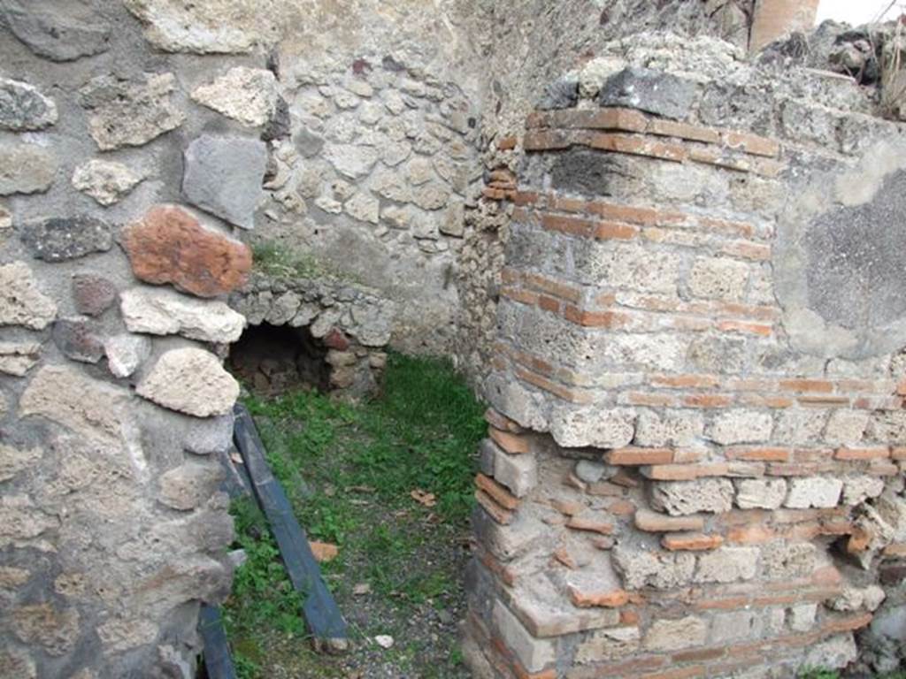 VIII.3.21 Pompeii. December 2007. Room to north of entrance. Kitchen (10) with oven.