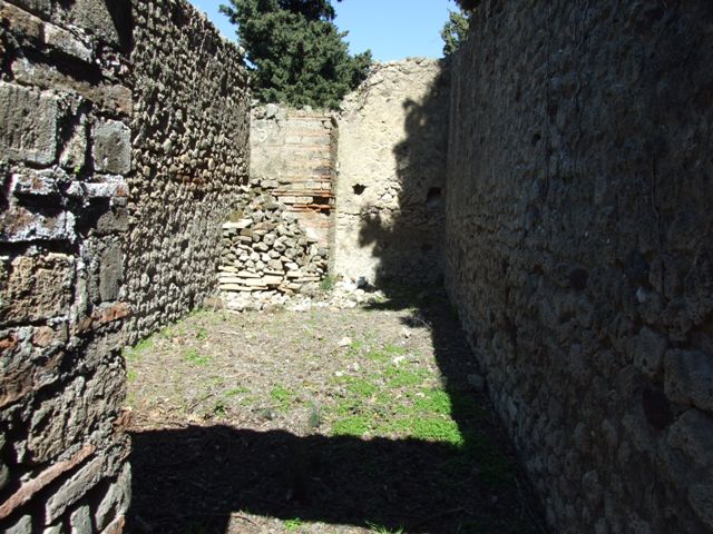 VIII.5.37 Pompeii.  March 2009. Doorways to Rooms 4 and 2, on east side of Atrium.