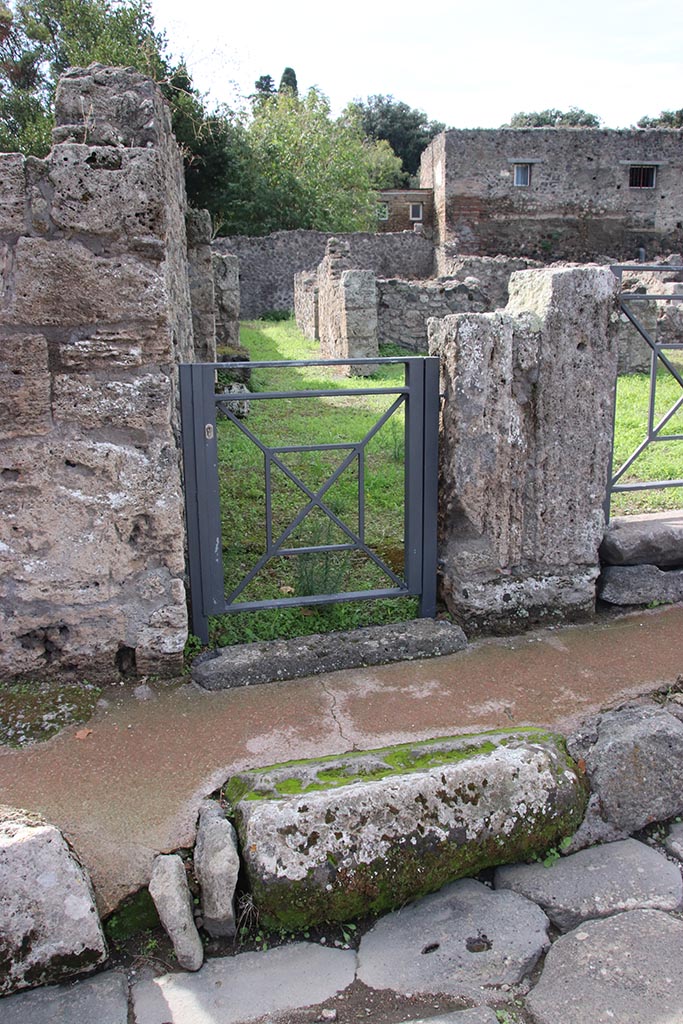 VIII.7.7 Pompeii. October 2024. 
Entrance doorway to steps to upper floor. Photo courtesy of Klaus Heese.
