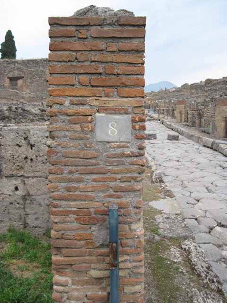 VIII.7.8 Pompeii. September 2010. ID plate on north wall of entrance. 
Photo courtesy of Drew Baker.
