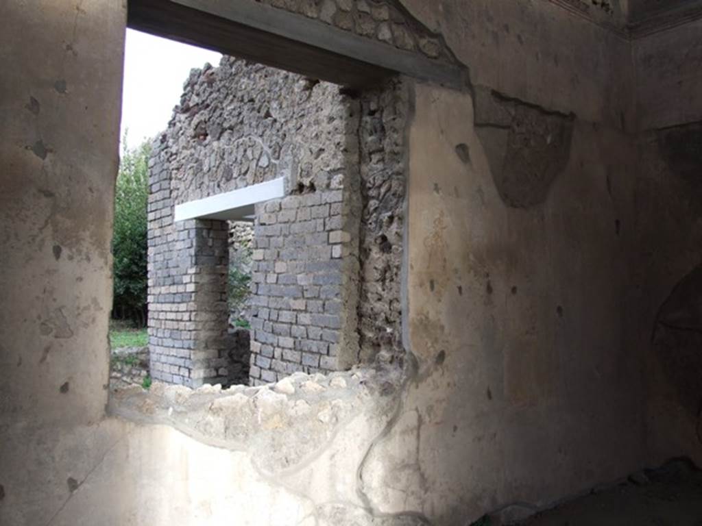 IX.1.20 Pompeii. December 2007. Room 9, remains of wall decorations at east end of north wall.