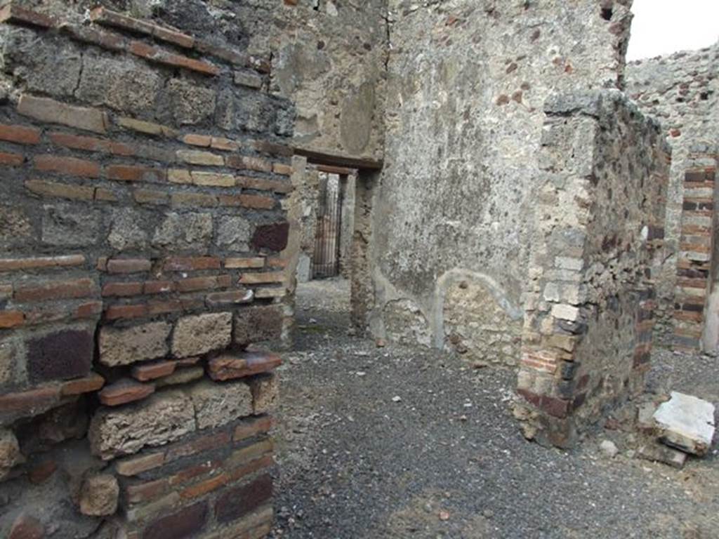 IX.2.21 Pompeii. March 2009. Room 5, triclinium. Looking north-east, from room 12, the north portico.