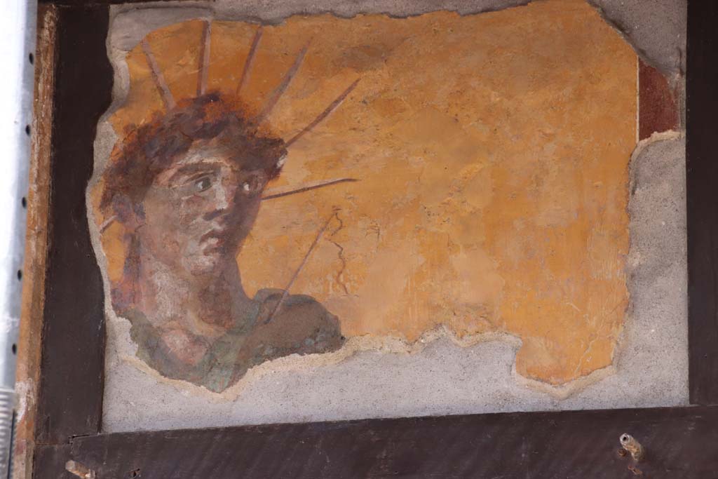 IX.7.1 Pompeii. September 2019. Painting of Apollo or Sol with the cosmic crown and a whip.  
Photo courtesy of Klaus Heese. 
