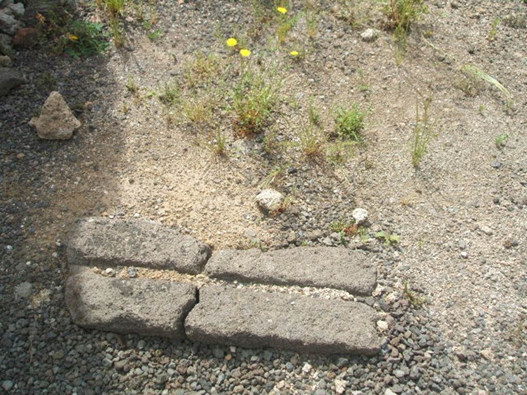 IX.7.21 Pompeii. May 2005. Remains of a threshold or sill.