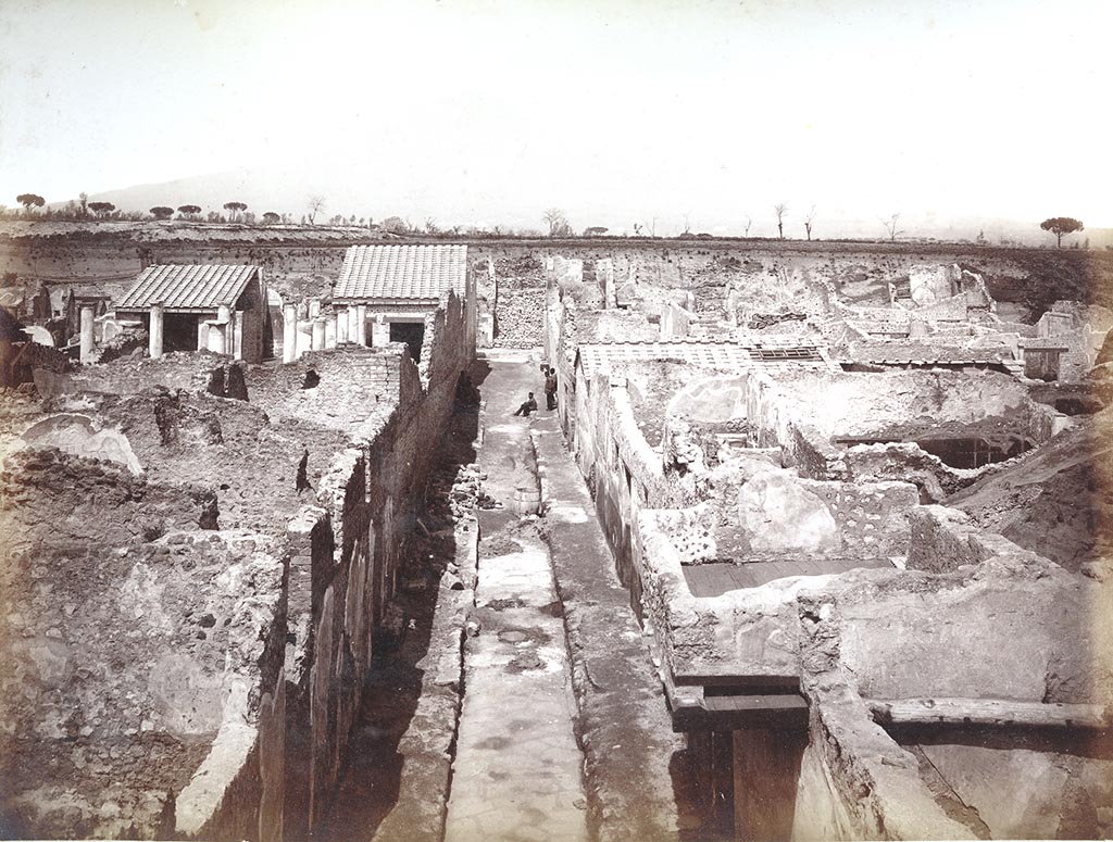 IX.8.8 Pompeii, on left. Undated photo by Sommer numbered 1298. 
Looking north along unnamed vicolo between IX.8 on left and IX.9 on right, with ongoing work taking place in the vicolo.
Photo courtesy of Espen B. Andersson.

