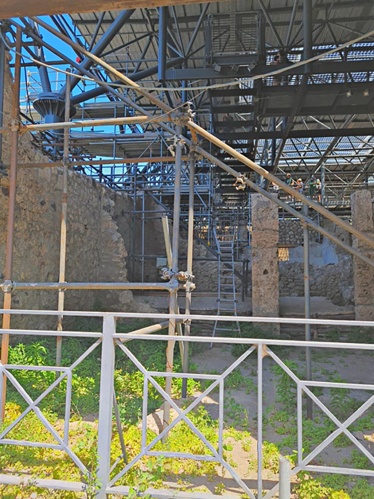 IX.12.1 Pompeii. June 2024. 
Looking north through entrance doorway into room “a”, with rear rooms “b”, on left, and “c”, on right. 
Photo courtesy of Giuseppe Ciaramella.

