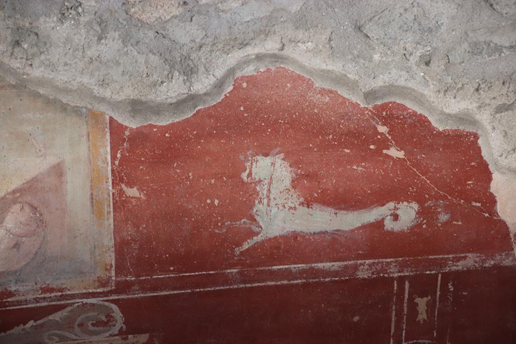 IX.12.9 Pompeii. October 2024. Room 3, detail from upper east wall. Photo courtesy of Klaus Heese.