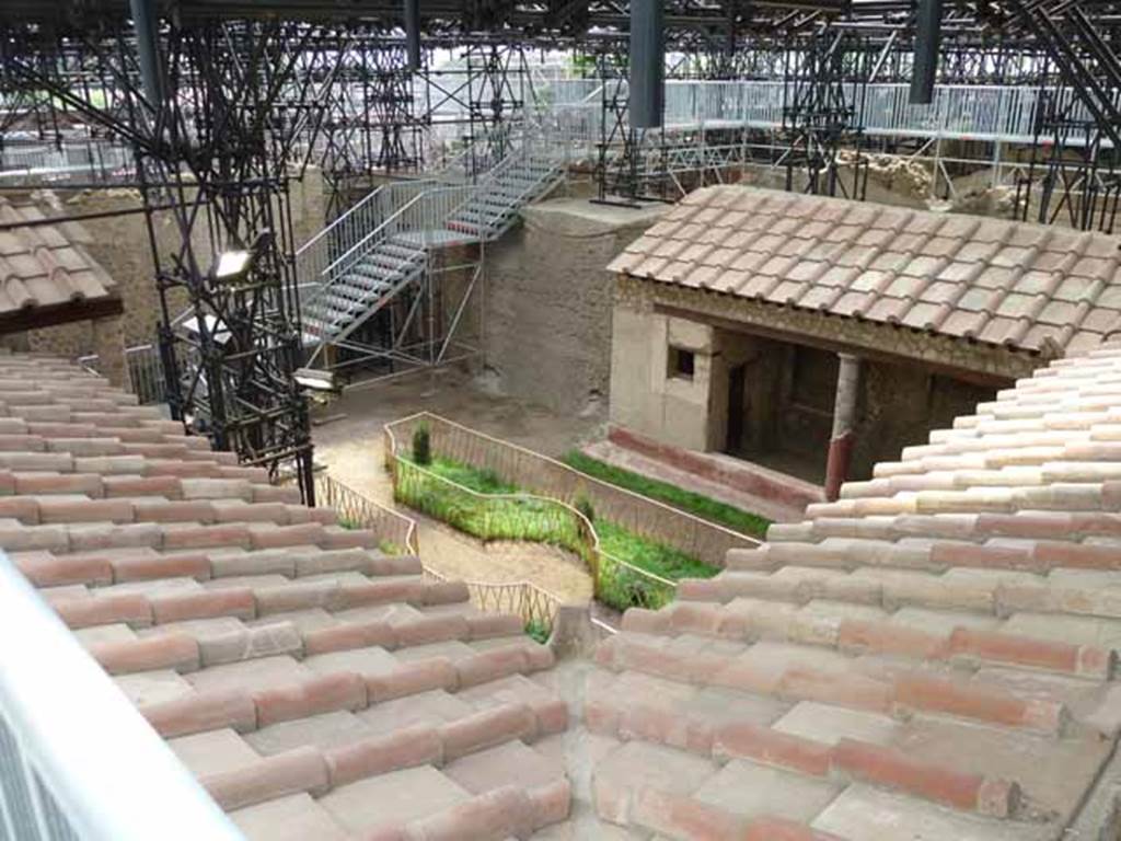 IX.12.9 Pompeii. May 2010. Looking south west across roof of garden area 8.