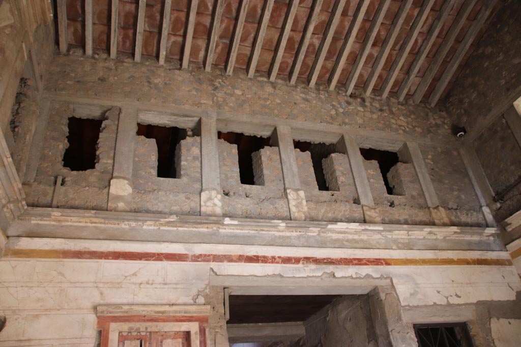 IX.13.1-3 Pompeii. October 2022. Room 1, looking towards upper north wall. Photo courtesy of Klaus Heese. 