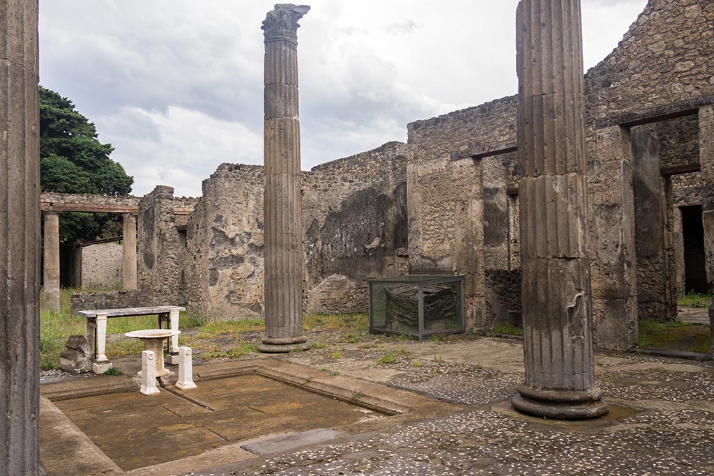 IX.14.4 Pompeii. July 2024. Looking south-west across impluvium in atrium. Photo courtesy of Johannes Eber.