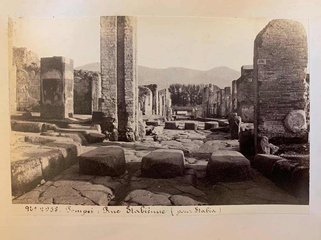 Via Stabiana, Pompeii. Photo number 2958 from an album of Michele Amodio dated 1874, entitled “Pompei, destroyed on 23 November 79, discovered in 1745”. 
Looking south across junction with Via dell’Abbondanza, at Holconius’ crossroads. Photo courtesy of Rick Bauer.

Looking south across junction with Via dell’Abbondanza, at Holconius’ crossroads. Photo courtesy of Rick Bauer.
