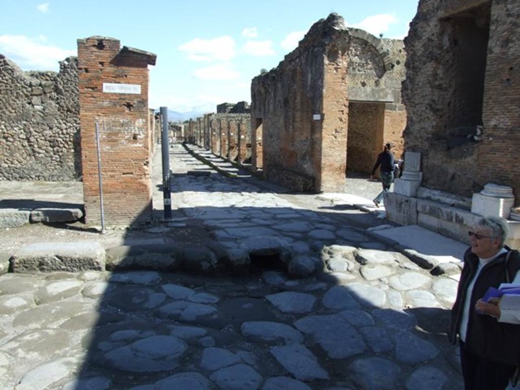 Via del Foro. March 2009. South End. Looking east along Via degli Augustali between VII.4 and VII.9. 
