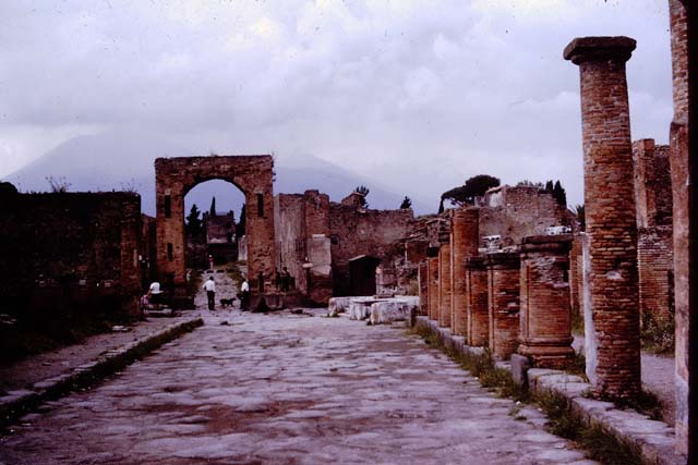 Via del Foro, Pompeii. 1964. Looking north. Photo by Stanley A. Jashemski.
Source: The Wilhelmina and Stanley A. Jashemski archive in the University of Maryland Library, Special Collections (See collection page) and made available under the Creative Commons Attribution-Non Commercial License v.4. See Licence and use details.
J64f1001
