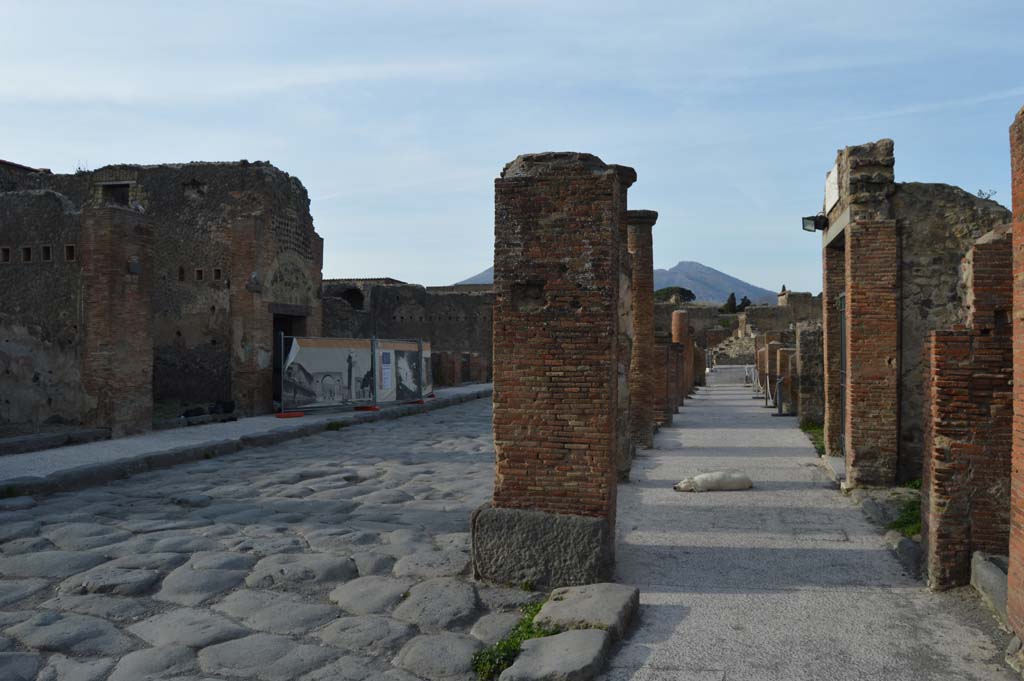 Via del Foro, east side, Pompeii. March 2019. Looking north along pavement underneath portico, from VII.4.12, on right.
Foto Taylor Lauritsen, ERC Grant 681269 DCOR.
