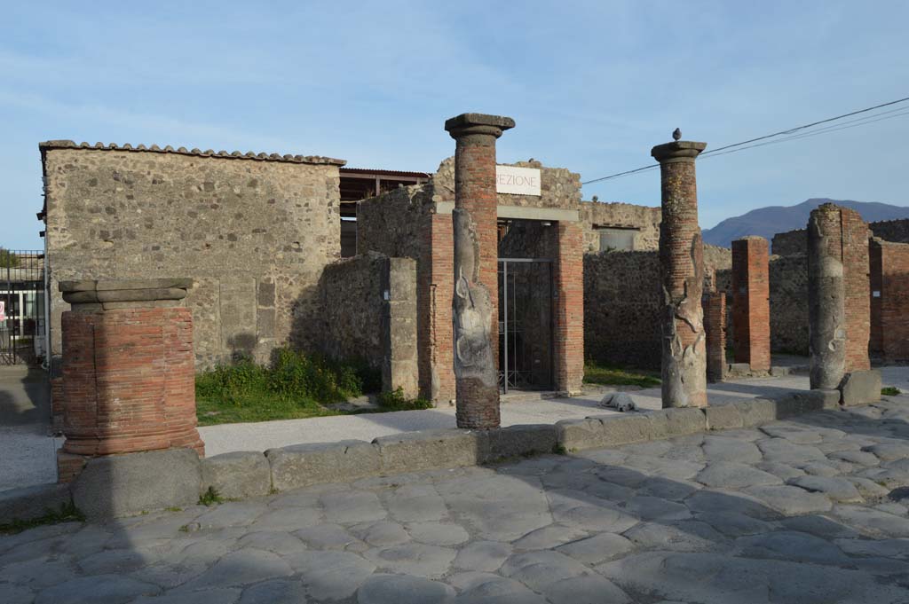 Via del Foro, east side, Pompeii. March 2019. 
Looking east towards fourth pilaster/column, on left, third and second column, and pilaster/column at south end, on right, outside VII.4.12. 
Foto Taylor Lauritsen, ERC Grant 681269 DCOR.
