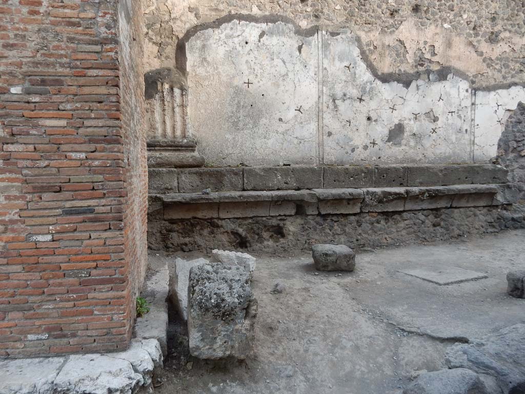 Vicolo dei Soprastanti, Pompeii. June 2019. Looking south from arch, (on left) towards north wall of Forum. 
Photo courtesy of Buzz Ferebee.


