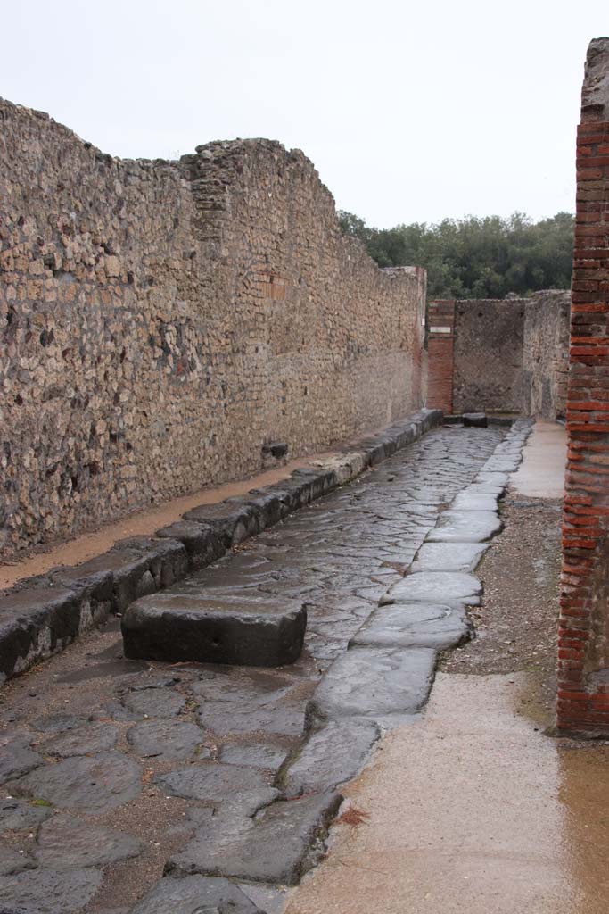 Vicolo della Regina, north side, Pompeii. September 2021. 
Looking north-west towards entrance doorway to VIII.3.16. Photo courtesy of Klaus Heese.

