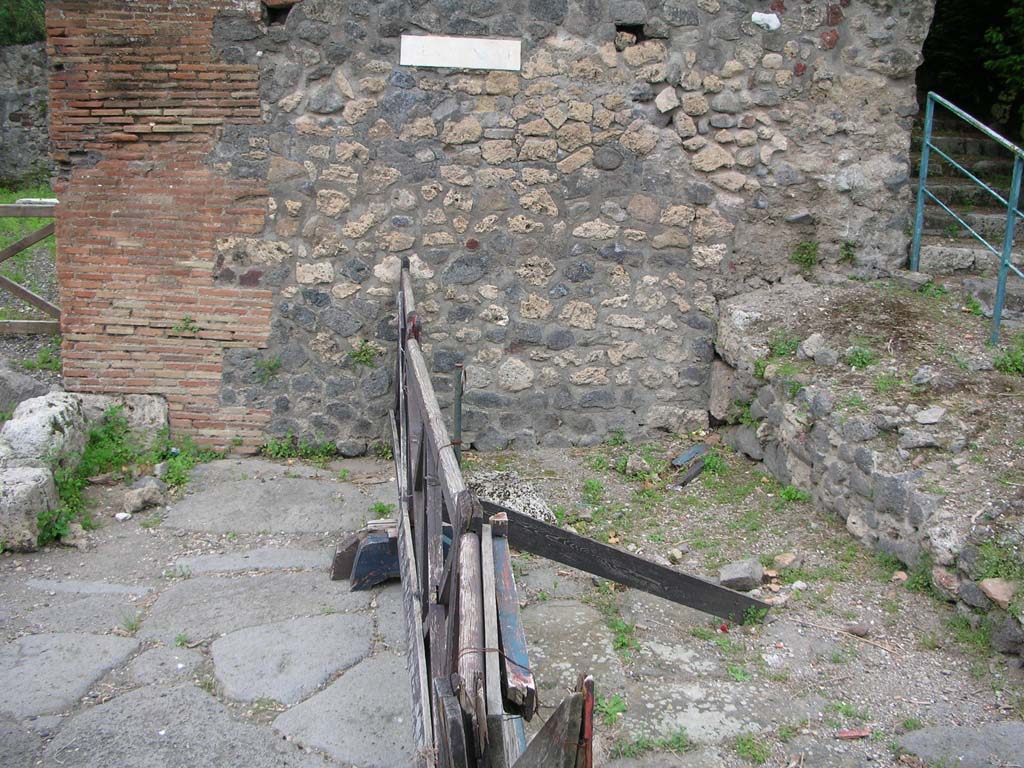 Tower XI, Pompeii. May 2010. 
Looking towards west side of Via di Mercurio, with steps on south-west side of Tower XI. Photo courtesy of Ivo van der Graaff.

