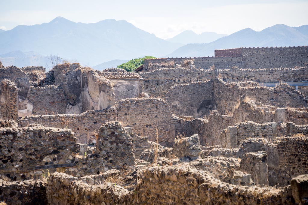 Tower XI, Pompeii. August 2023. Looking south-east from Tower across VI.11 towards VI.15. Photo courtesy of Johannes Eber.