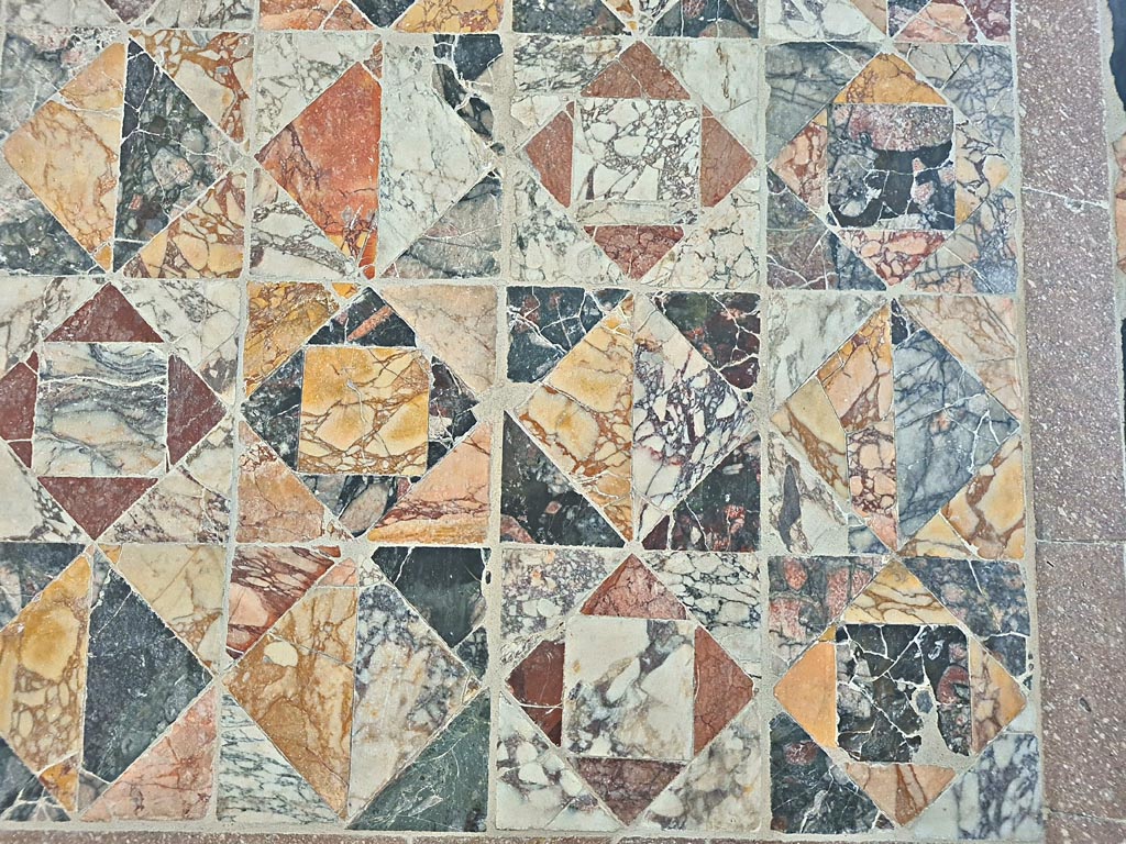 Opus Sectile floor on display in room CXLII on First floor in Naples Museum. June 2024. Photo courtesy of Giuseppe Ciaramella.
Detail from lower corner
