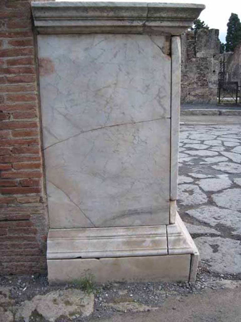 Arch of Marcus Holconius Rufus. September 2010. Detail of marble veneer on north-west pillar, north side. Photo courtesy of Drew Baker.