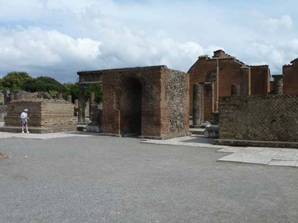 Arched monument at south end of Forum. May 2010. North side.