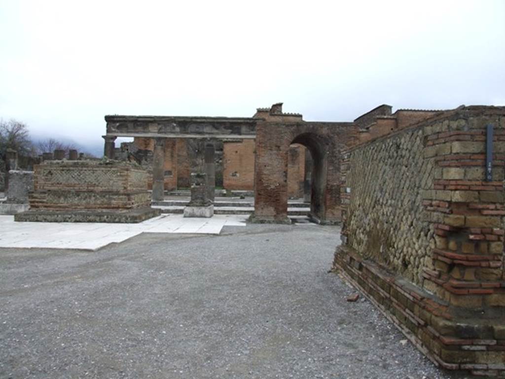 Arched monument at south end of Forum. March 2009. North side, looking south-east.